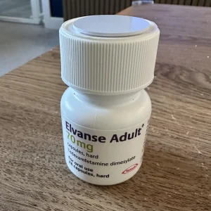 Blå og orange Elvanse 70 mg kapsler i original beholder